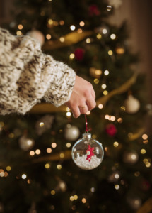 woman holding bauble hand